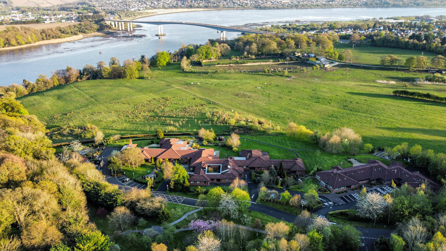 The Foyle Hospice buildings and landscaped gardens beside the River Foyle