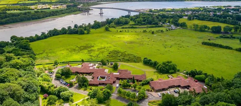 Aerial view of Foyle Hospice and its gardens beside the River Foyle