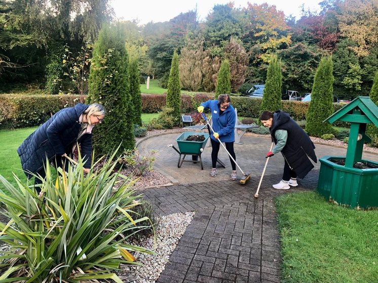 Volunteers tending the gardens at Foyle Hospice